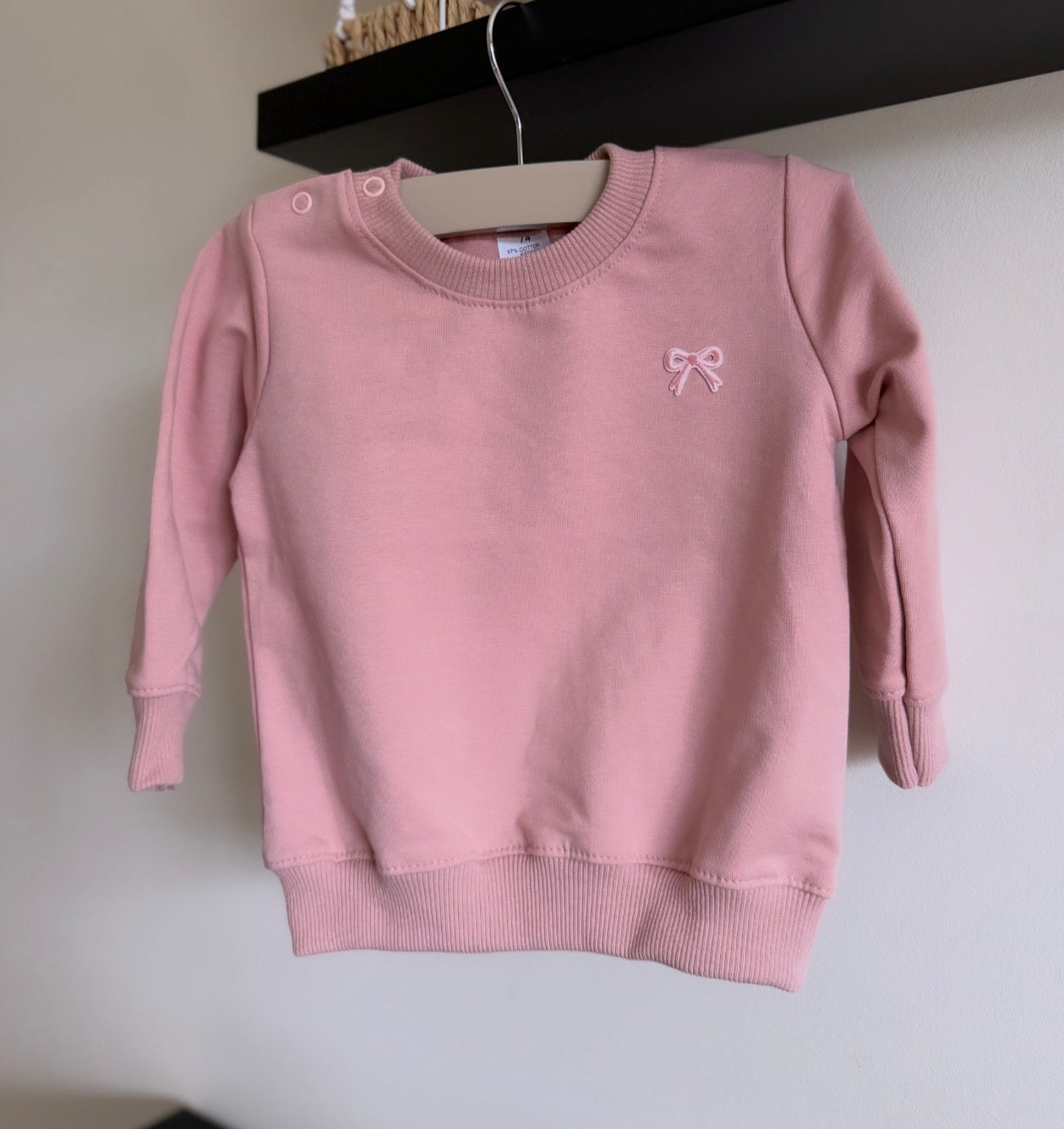 Sweater strikje donker roze