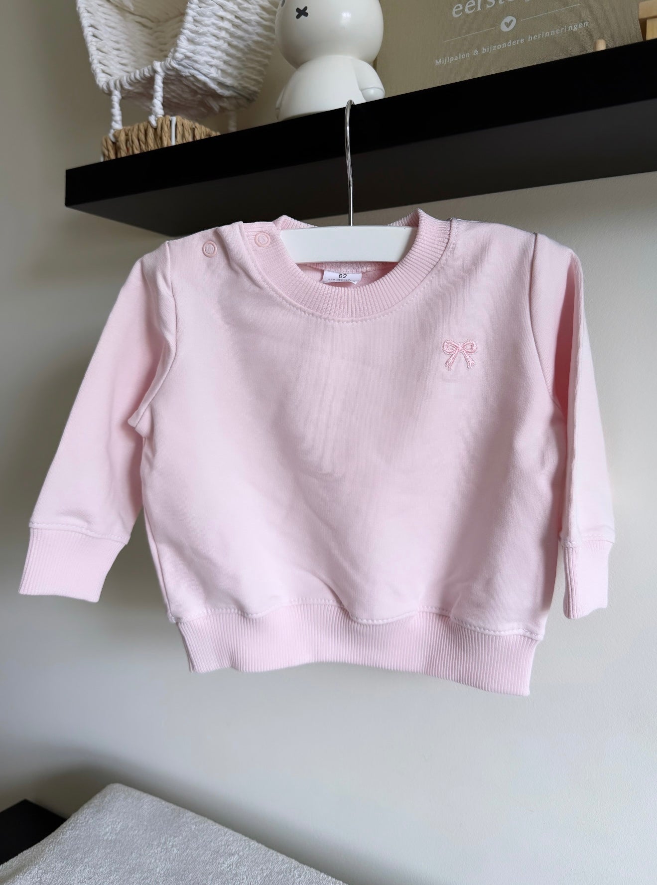 Sweater strikje licht roze